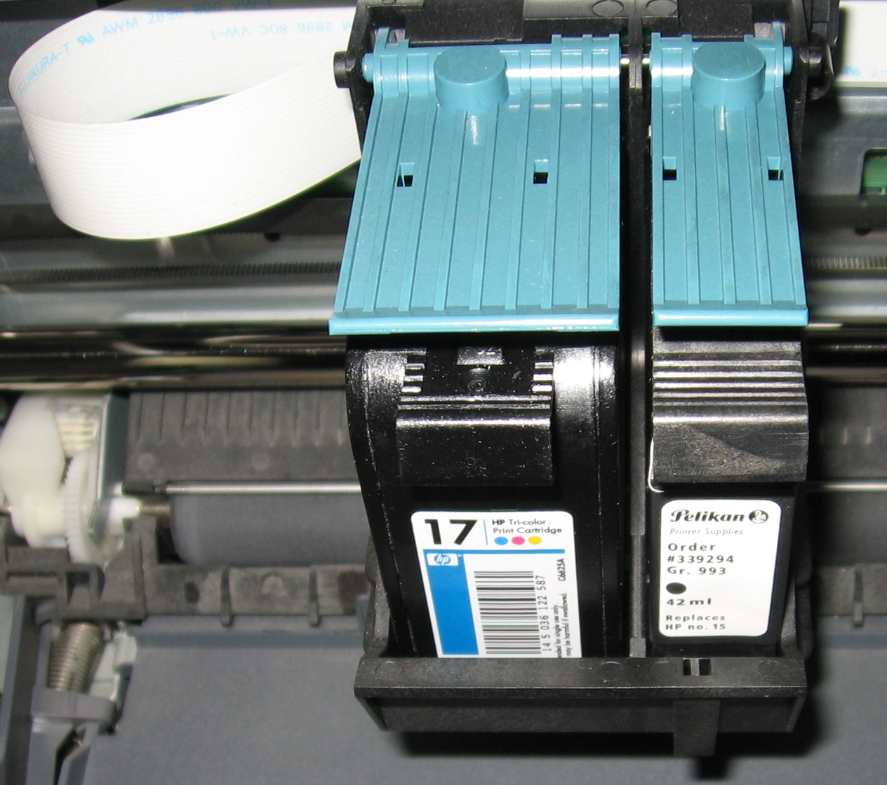 Cleaning electrical contacts on printer cartridge